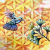 cuadro con colibri y flor de la vida